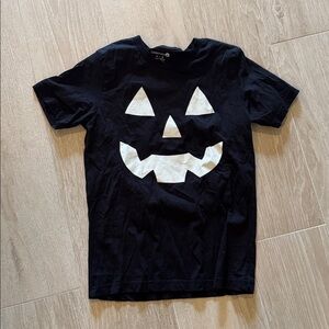 Unisex Black Tee with White Pumpkin Design glow in the dark